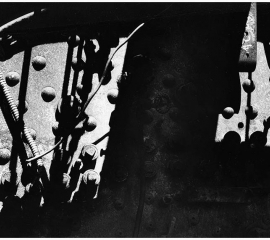 Ghost in the Machine - Two. Light and shadow move across the back-head like a sundial.  Someone has just left the room.